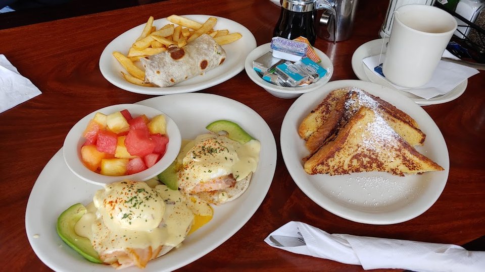 Menu pages for eggs, sandwiches, and chowder.
