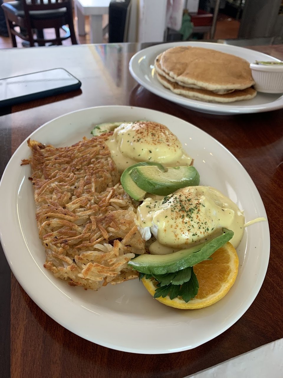 Breakfast plates and coffee on a café menu.
